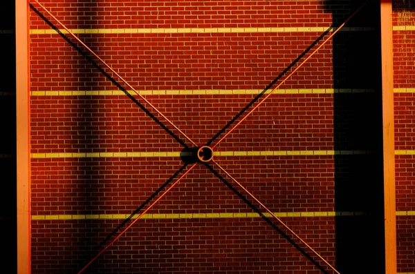 Frame bracing on warehouse wall during sun set. — Stock Photo, Image