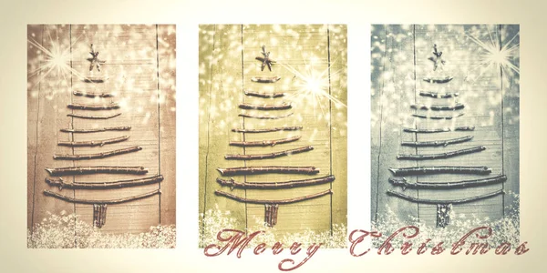 Palabras Feliz Navidad escrita en tríptico nevado en marrón, verde y azul. Árboles de Navidad hechos de ramas de madera . — Foto de Stock