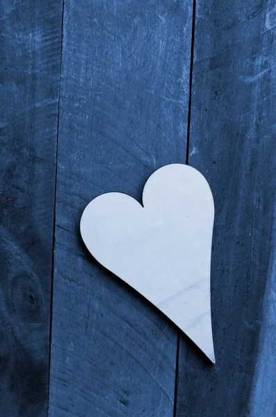 Wooden heart on wooden background — Stock Photo, Image