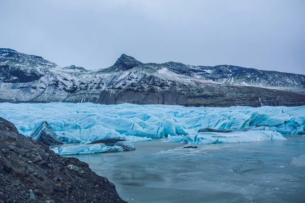 Západ slunce nad horami na Islandu — Stock fotografie