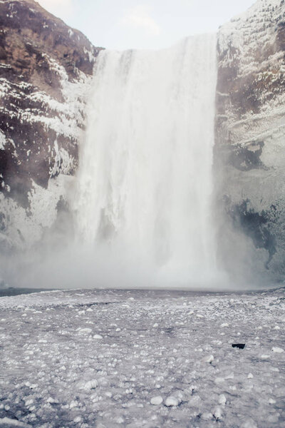 Great waterfall in rocky mountains 