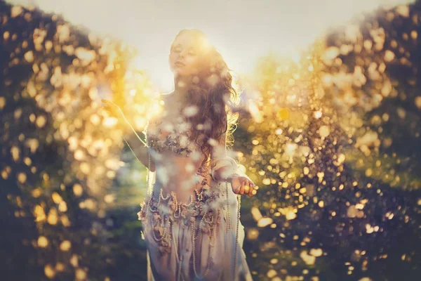 Woman in white dress over lake and forest — Stock Photo, Image