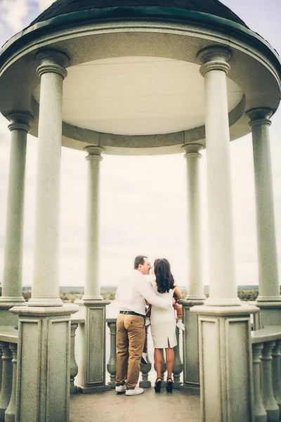 lovely couple on stone balcony