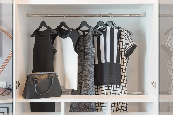 black and white clothes hanging