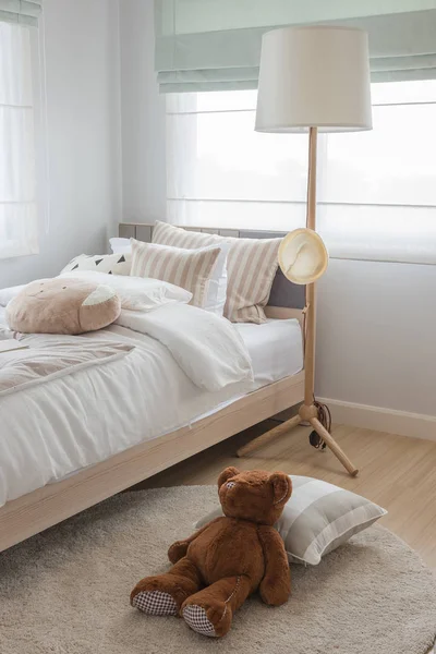 Dolls on bed in kid,s bedroom — Stock Photo, Image