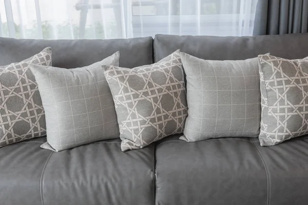 Modern living room with row of pillows — Stock Photo, Image