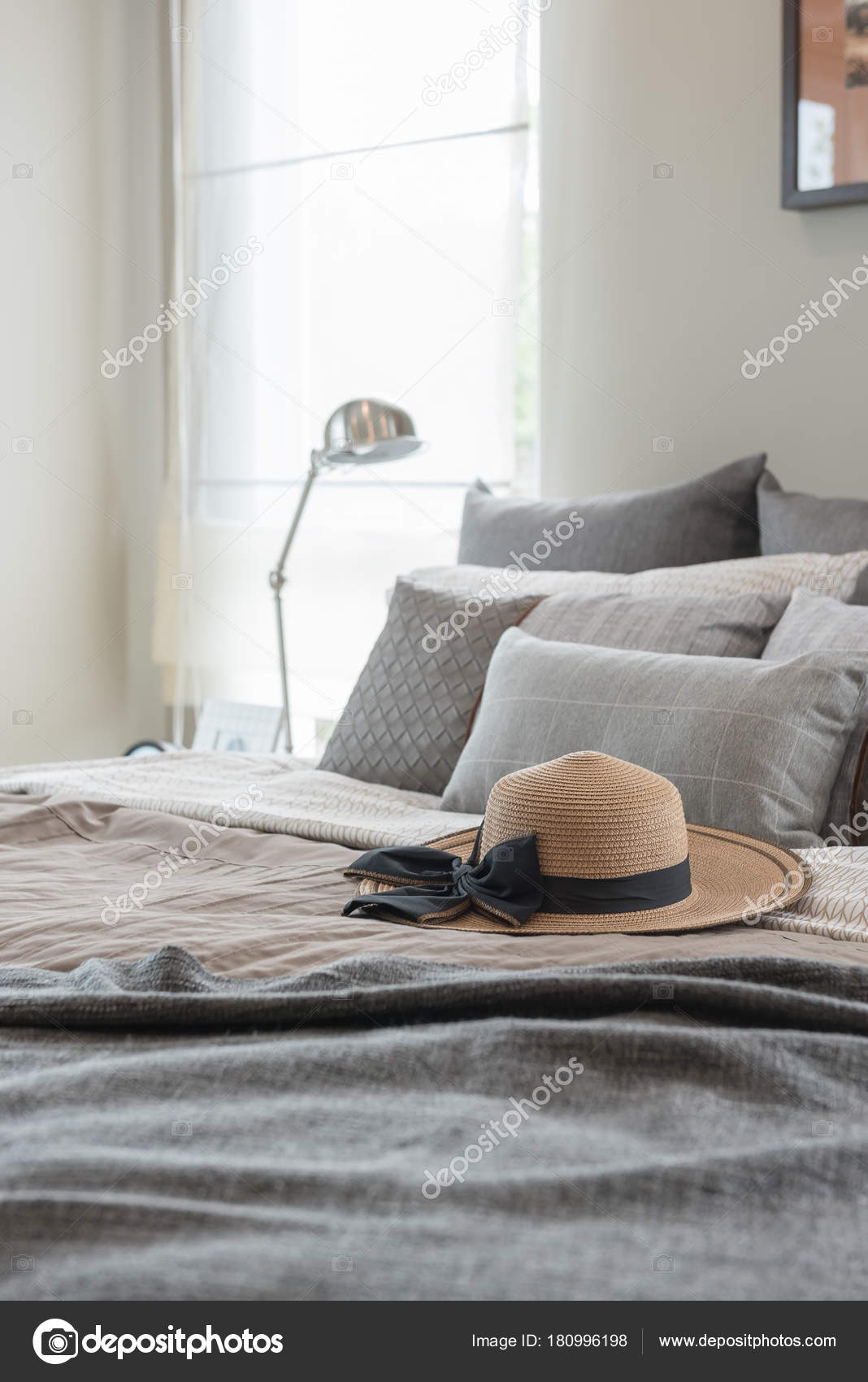 Contemporary Style Bedroom Earth Tone Color Hat Pillows Bed