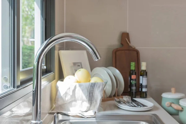 Stainless steel sink with faucet on kitchen — Stock Photo, Image