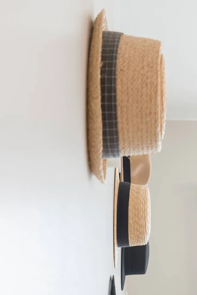 Hats hanging on wall — Stock Photo, Image