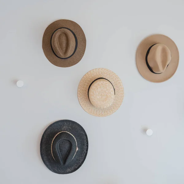 Hats hanging on wall — Stock Photo, Image