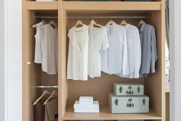 White color shirts hanging on rail — Stock Photo, Image