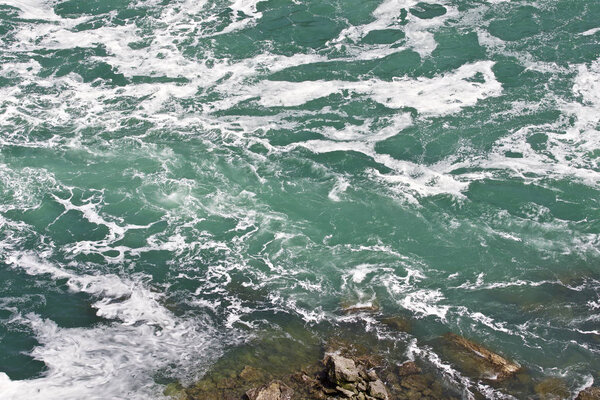 Beautiful background with the water near amazing Niagara falls