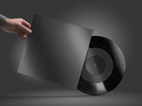 Vinyl registrera i hand mockup — Stockfoto