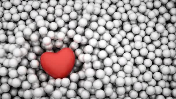 Forma vermelha do coração caindo em bolas brilhantes — Vídeo de Stock