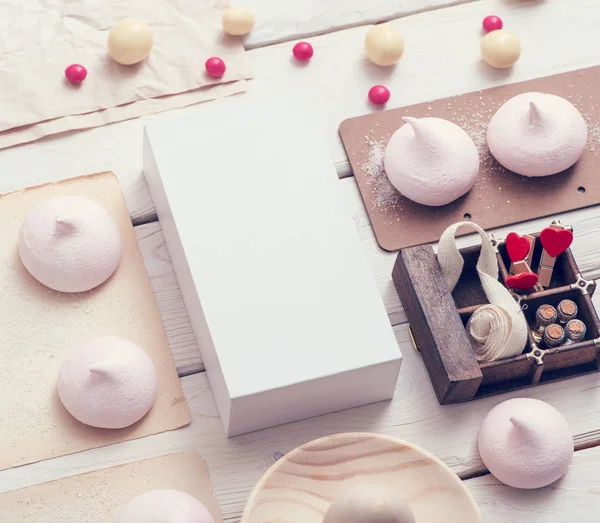 White box with different sweets on table — Stock Photo, Image
