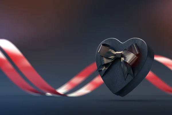 Caixa de presente em forma de coração com arco em preto — Fotografia de Stock