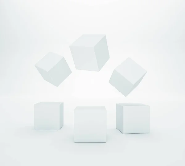Белые кубики на белом фоне . — стоковое фото