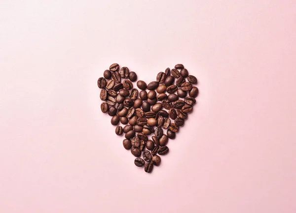 Top view of coffee beans in shape of a heart — Stock Photo, Image