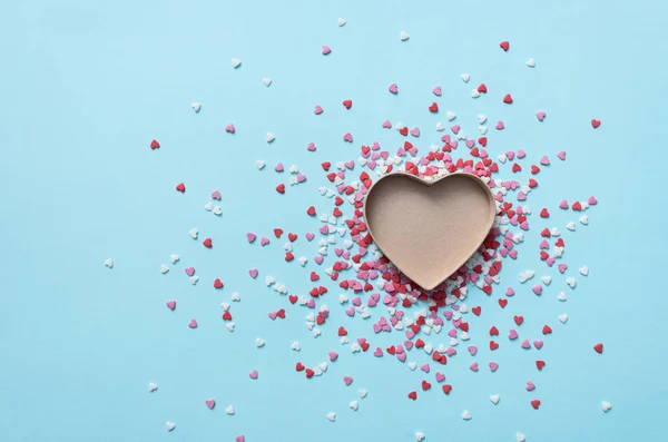 Open gift box with tiny hearts around it — Stock Photo, Image