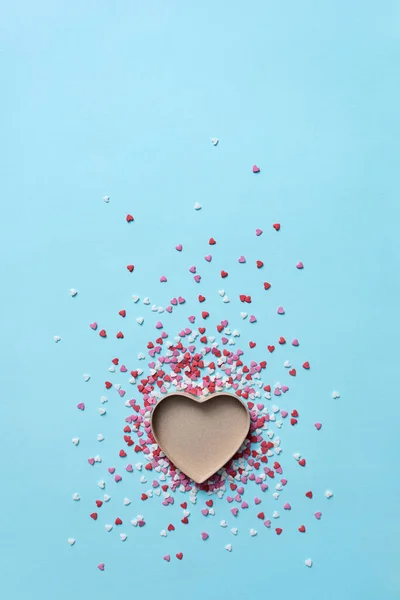Open gift box with tiny hearts around it — Stock Photo, Image