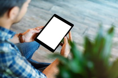 Man using tablet computer. Clipping path.