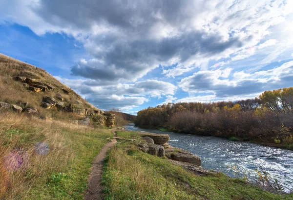 Autumn landscape with a river. Yellow leaves, river, autumn forest, hills, autumn, September, October. Russian landscape in autumn. Autumn in Russia.Sunny autumn day.autumn mood.rest at nature.Autumn Walk