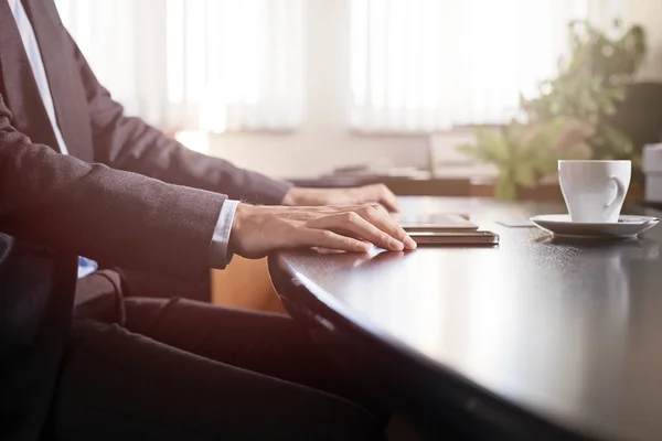 Business man hands on a table in a office — Stock Photo, Image