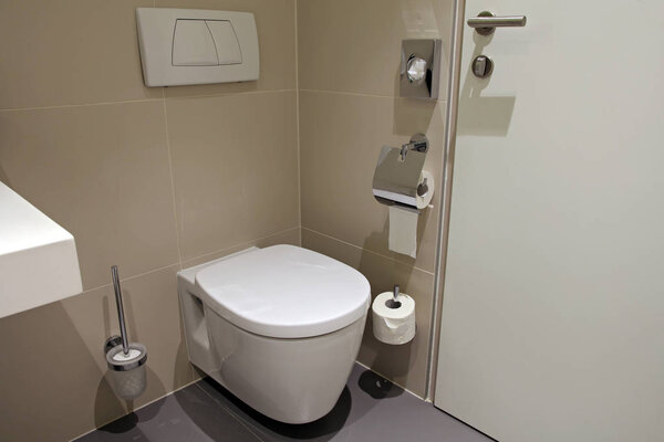 Bathroom toilet in modern minimalistic design.