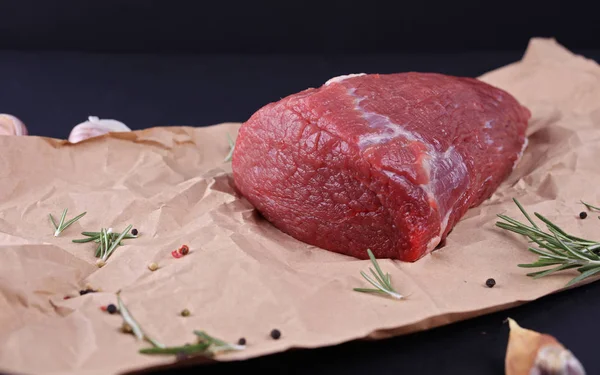 Raw beef meat steak , decorated with spices. Cooking , healthy eating concept.