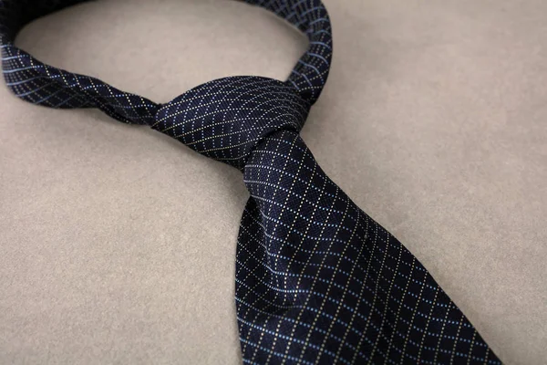 Blue elegant silk tie on light grey background. — Stock Photo, Image