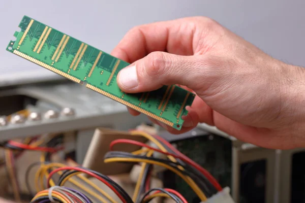 PC engineer repairing computer hardware in service center