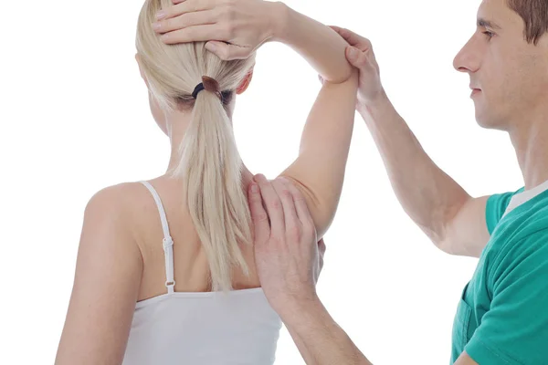 Vrouw met Chiropractie rug aanpassing geïsoleerd op een witte achtergrond. Osteopathie, alternatieve geneeskunde, pijn verlichting concept — Stockfoto