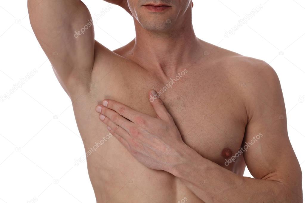 Muscular male torso close up , chest and armpit , underarm hair removal isolated on white background. Male Waxing. Laser hair removal