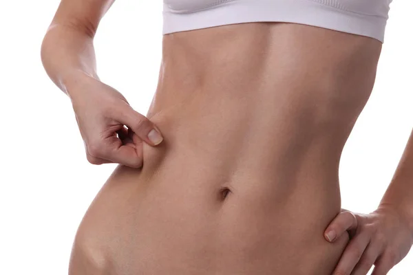 Vrouw meet lichaamsvet percentage. Perfect slank lichaam, taille close-up. Sport, fitness, Dieting resultaten. — Stockfoto