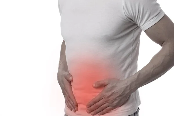 Mann mit Bauchschmerzen. Verdauungssystem, Probleme mit Harnwegsinfektionen. — Stockfoto