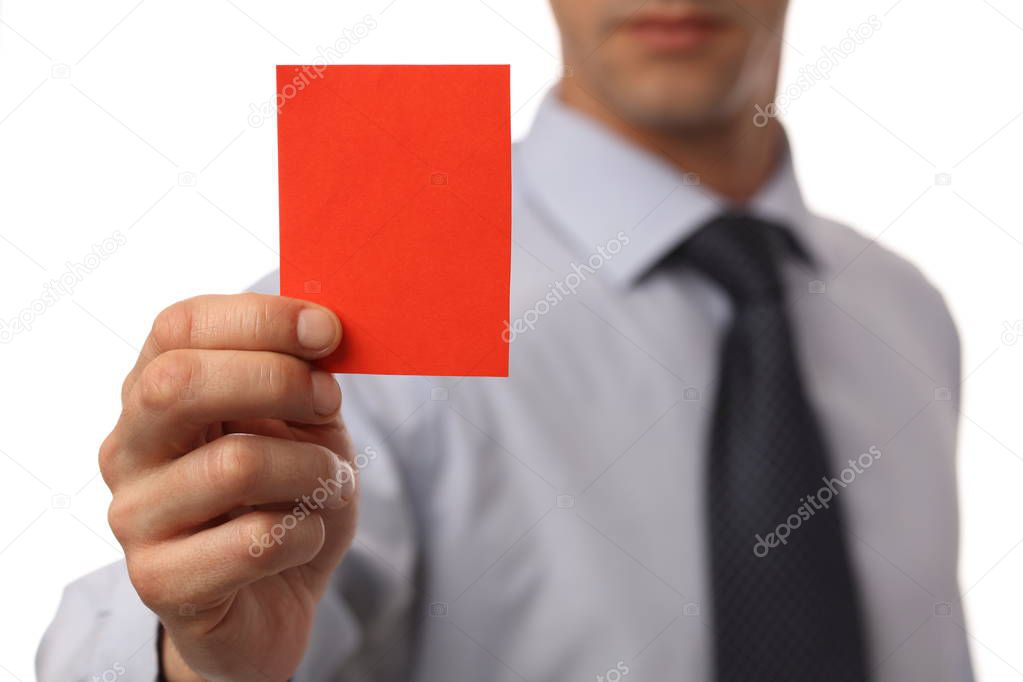Businessman showing red card. Business and finance concept. Exclusion