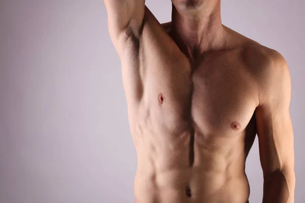 Close up of muscular male torso, chest and armpit hair removal. Male Waxing — Stock Photo, Image