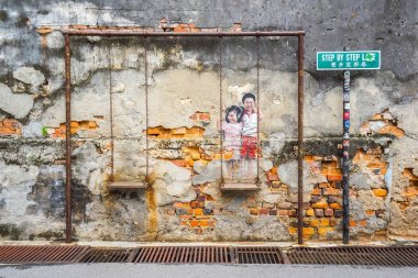 Çocuk George Town, bir salıncak üzerinde bir kaç boyama, 