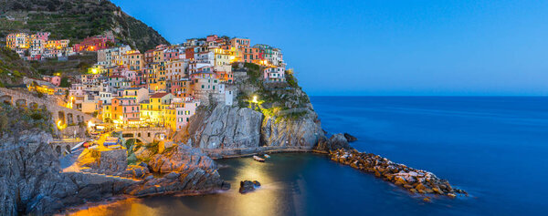 Manarola village one of Cinque Terre at night in La Spezia, Ital