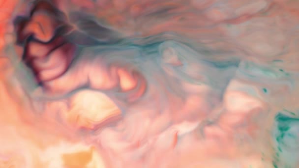 Encre dans l'eau. Sarcelle et encre orange réagissant dans l'eau créant un fond abstrait .