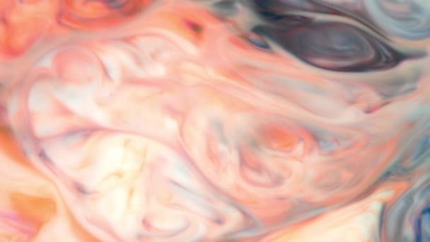 Encre dans l'eau. Sarcelle et encre orange réagissant dans l'eau créant un fond abstrait .