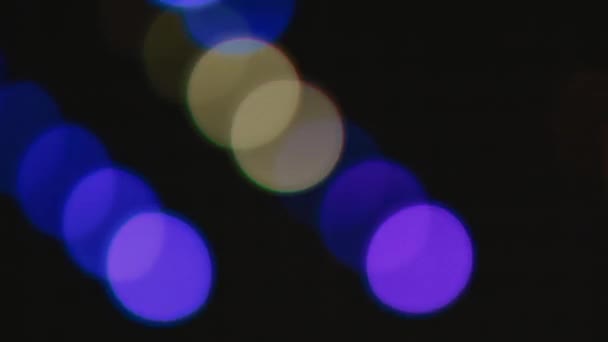 Fallende diagonale bunte Bokeh Lichter Effekt Hintergrund für Party — Stockvideo