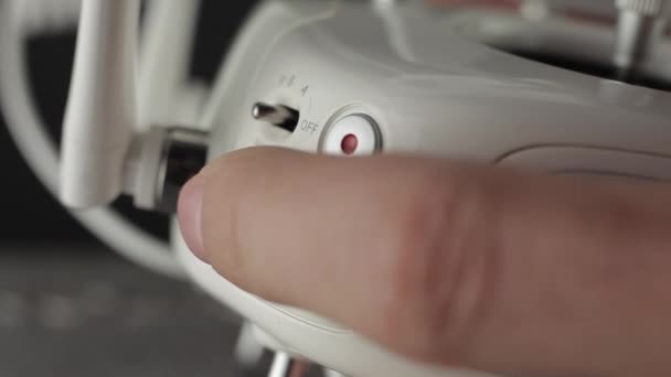 Checking remote controller function. Preparing a drone before flight. Close up — Stock Video