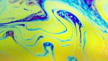 Renkli soyut arkaplan sıvısı gökkuşağı renkleri hareket halinde, makro çekim