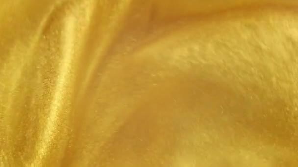 Gold Ink Particles Reacting In Water Creating Abstract beautiful background — Stock Video