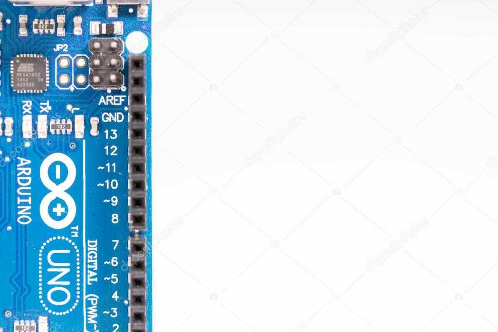 Photo of Atmel microcontroller on Arduino board, details of printed circuit board