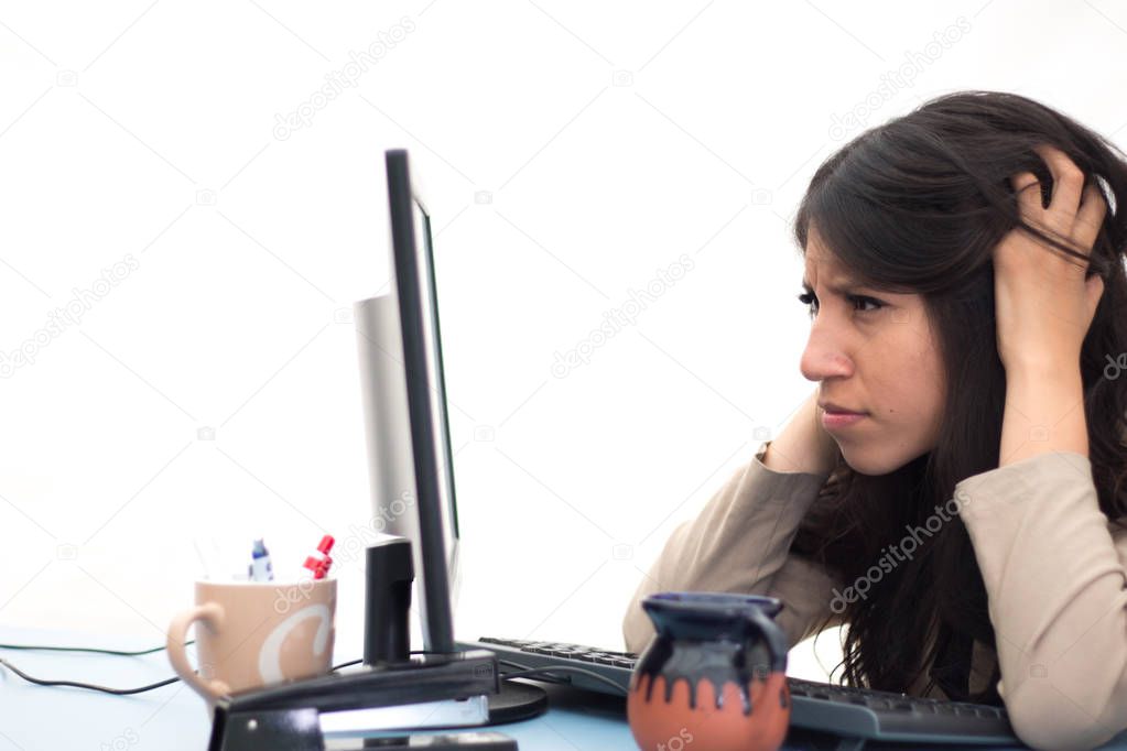  Totally overwhelmed office employee front of her computer screen