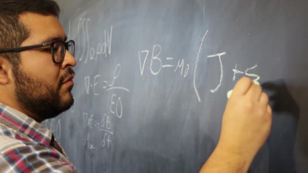 Advanced Physics Mexican Student Sketching Equations Blackboard — Stock Video
