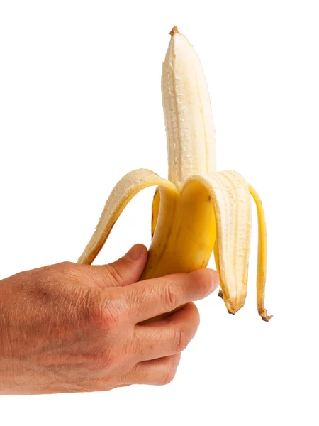 Peeled banana in human hand — Stock Photo, Image