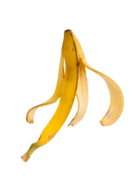Pele de banana escorregadia em um fundo branco — Fotografia de Stock